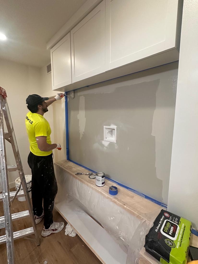Painting an accent wall above built-in cabinets