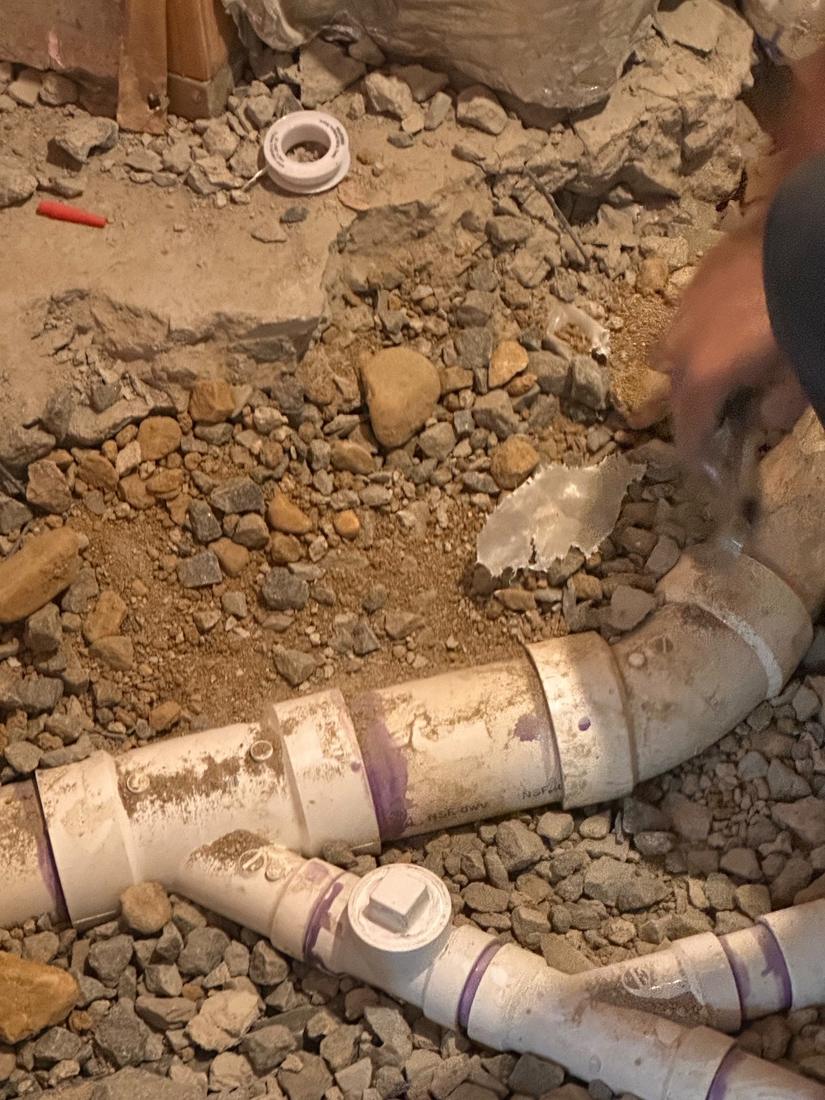 New drain line and cleanout set in the slab