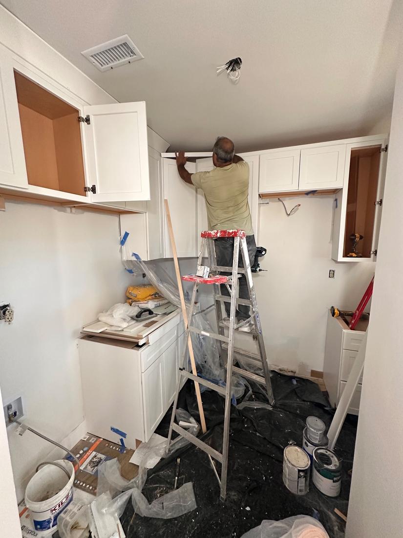 Installing cabinets and crown