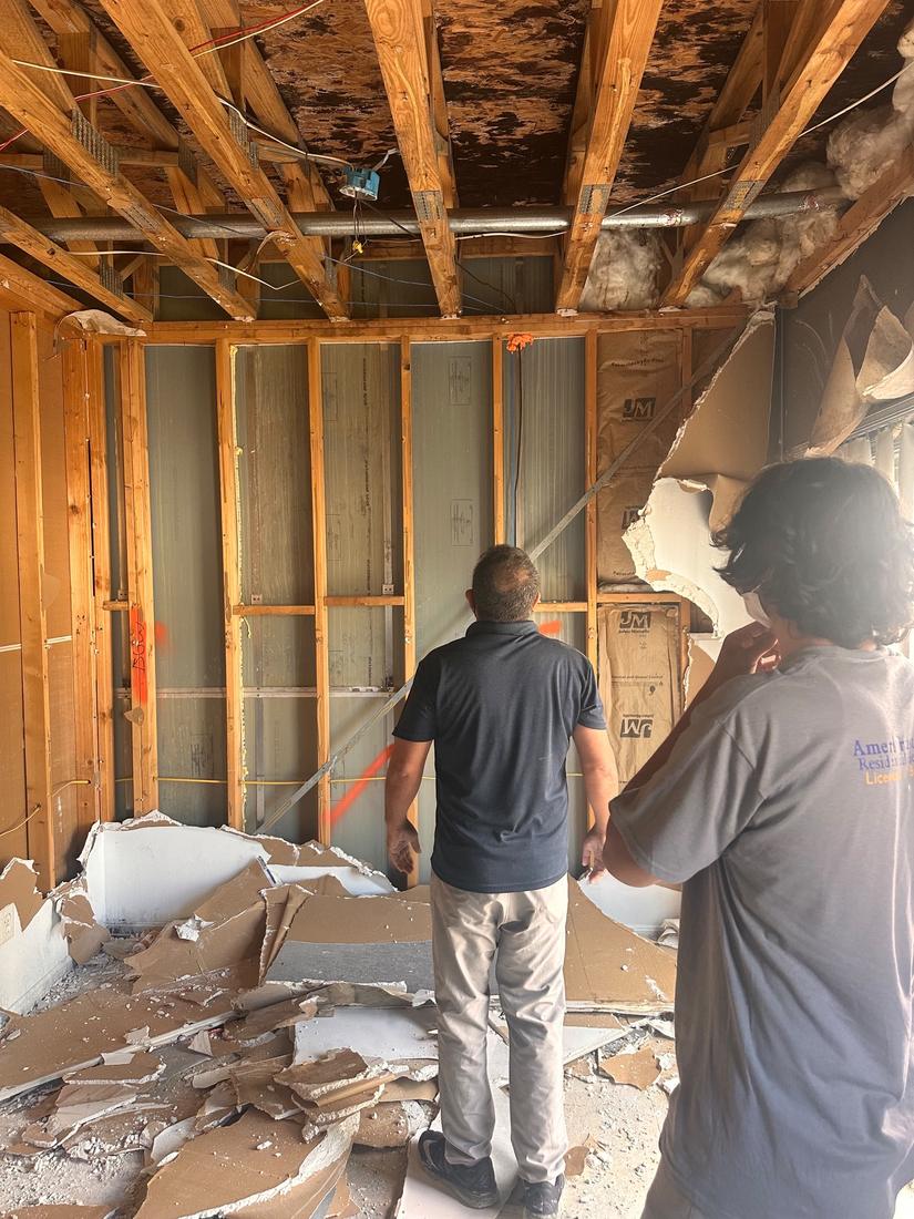 Walls opened to the framing during demolition