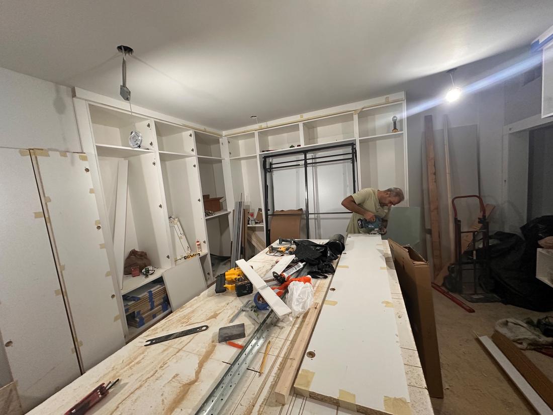 Assembling custom built-in cabinets and a wall bed