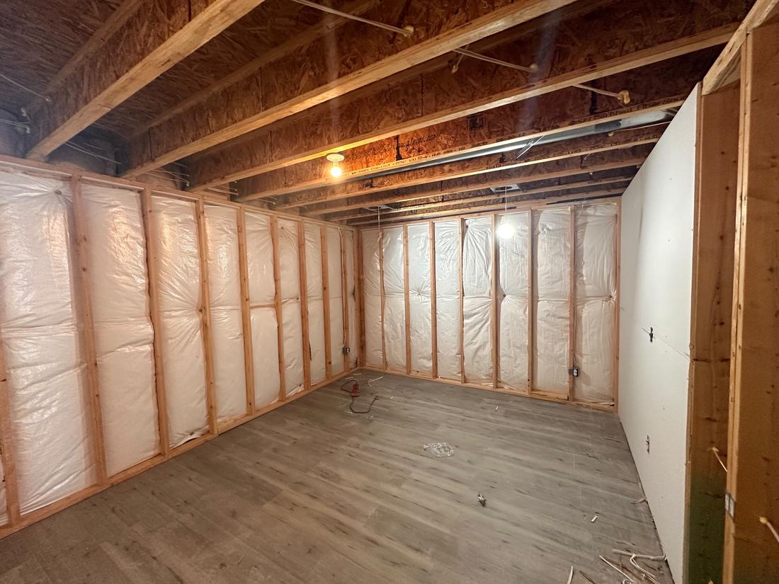 Basement framing and insulation before drywall