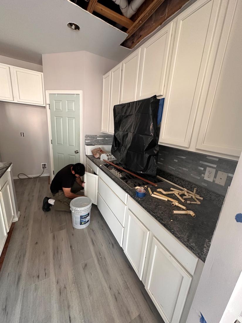 Kitchen refresh with painted cabinets and new flooring