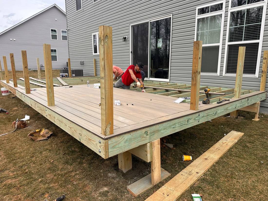 Installing composite decking over the new frame