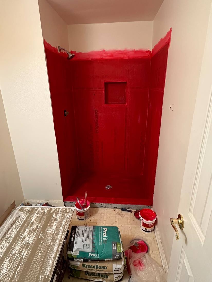 Shower waterproofing applied before tile