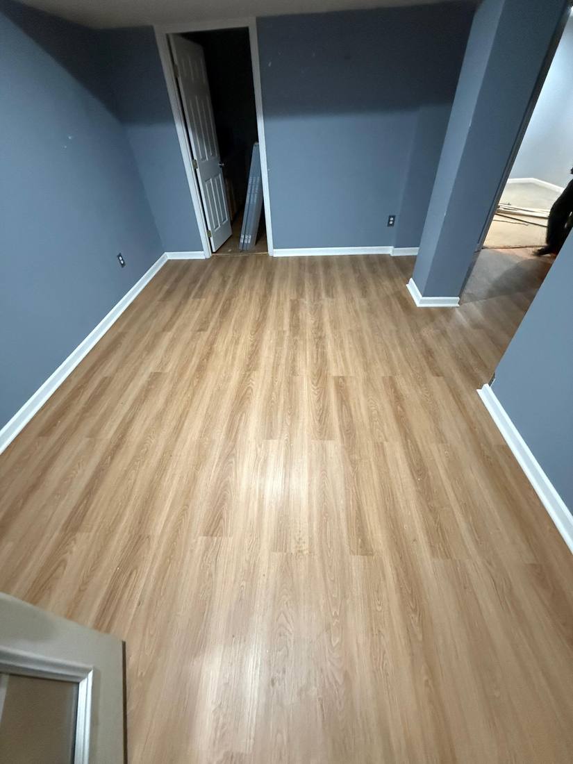 Finished plank flooring and fresh paint