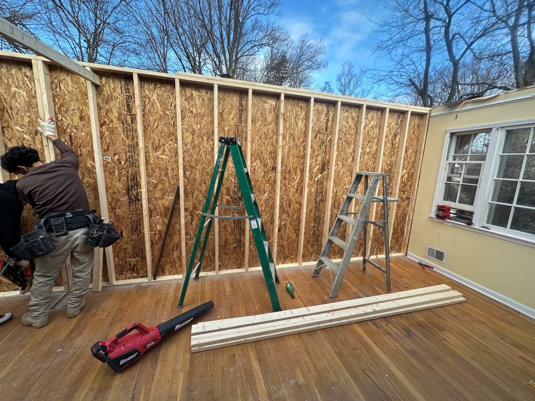 Addition wall framing with sheathing
