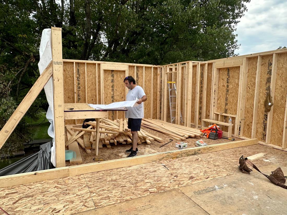 Reviewing the plans on a second-story addition deck